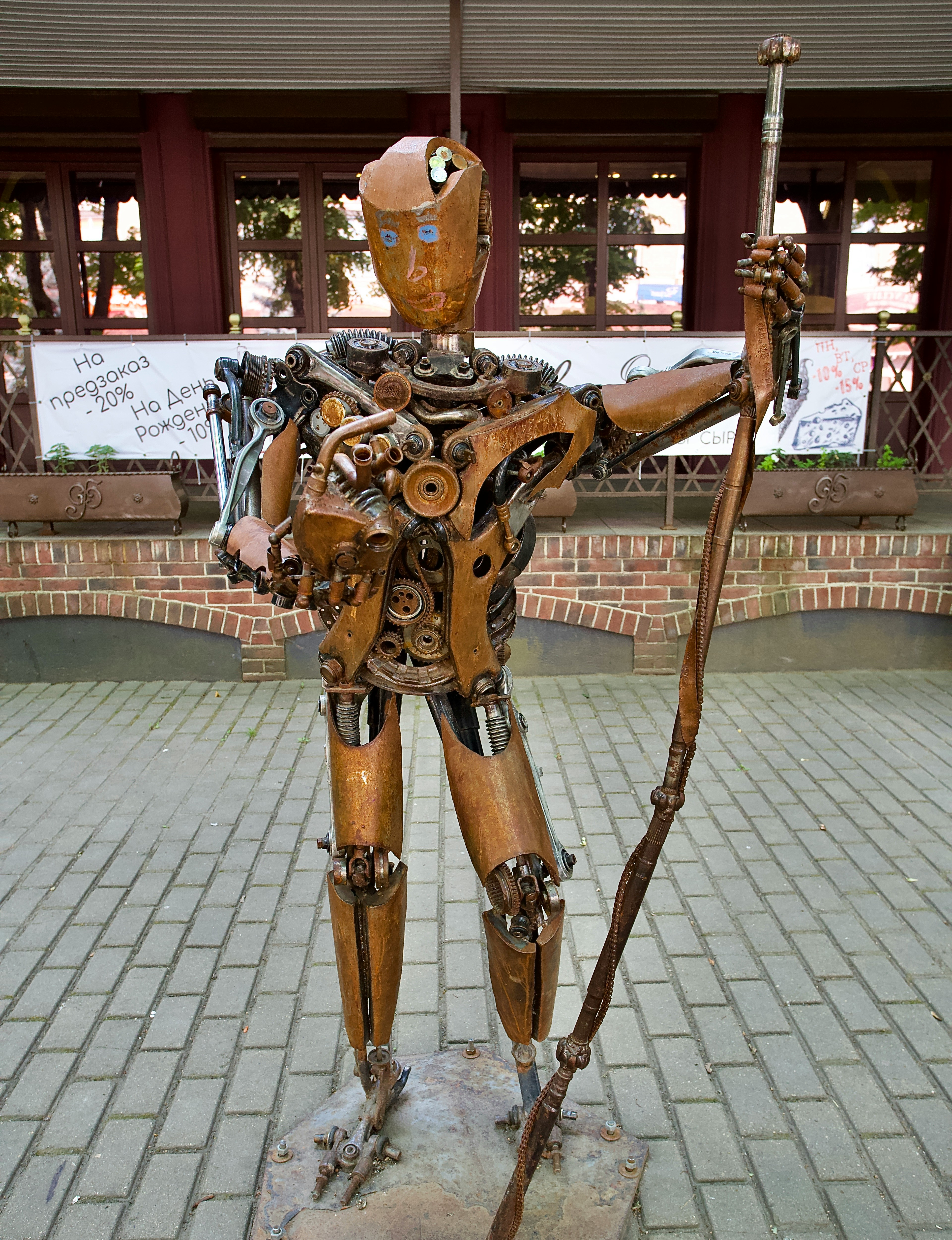 A futuristic scene showing Optimus Gen 2 robots interacting with advanced AI interfaces and holographic displays